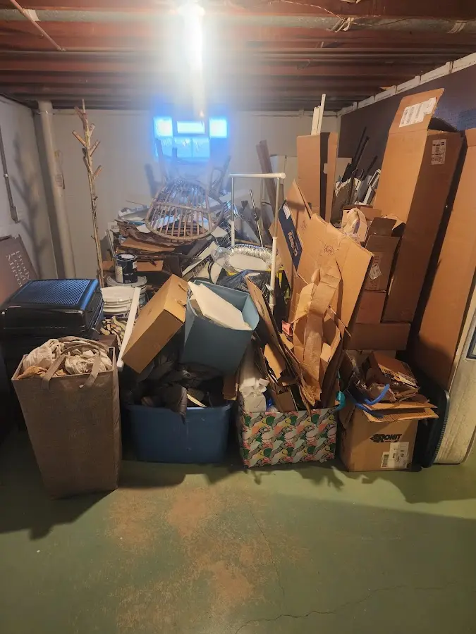 Roll-off dumpster container at job site for Construction Dumpster Rental in Delhi Hills